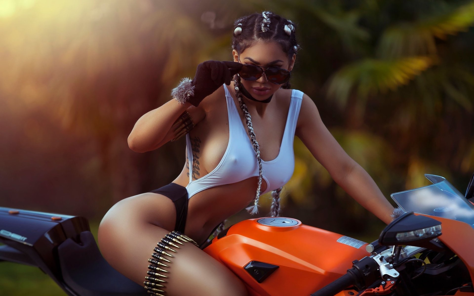 Take a pause and enjoy Girls with tattoos and motorcycles — streaming from Surat